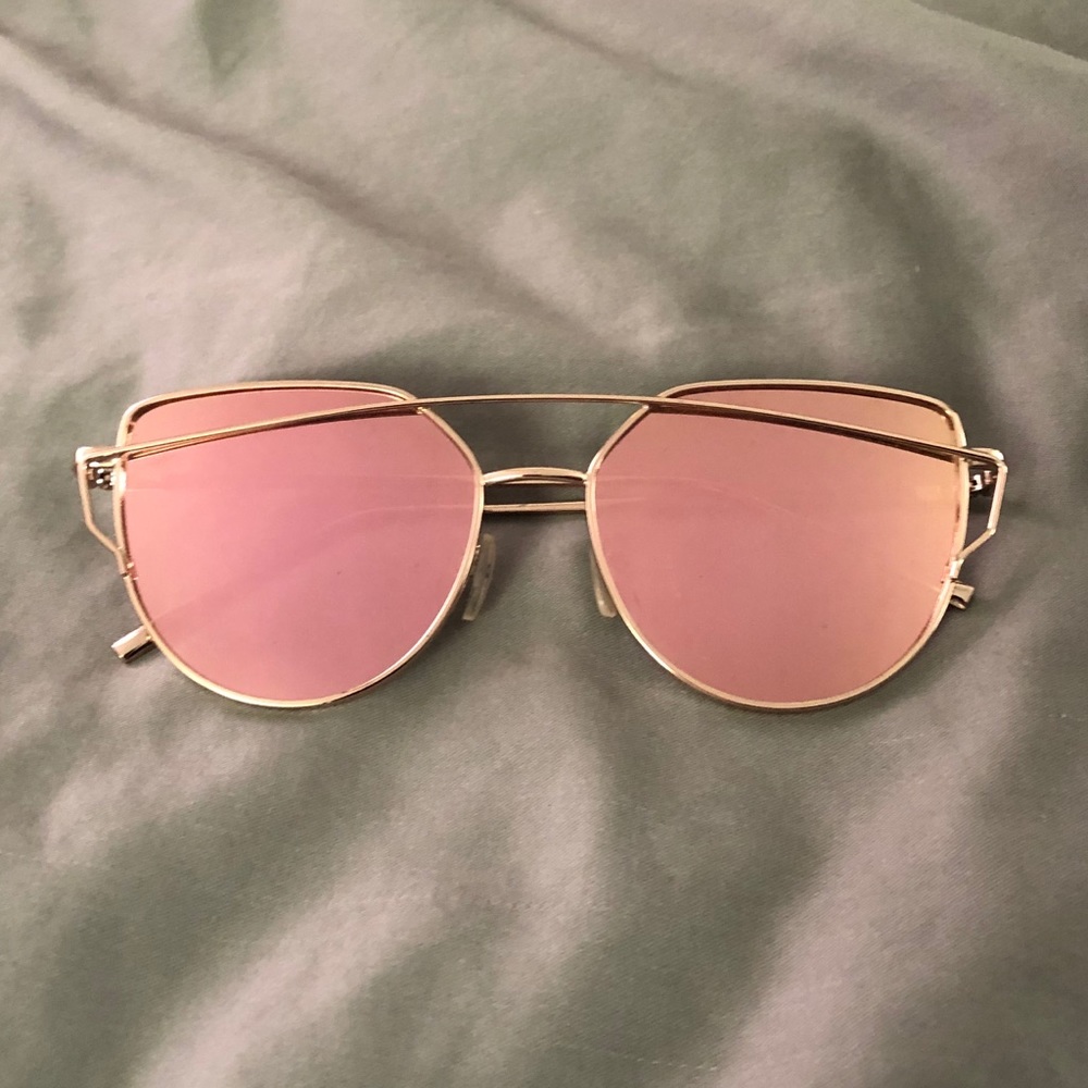 pink mirrored sunglasses.
